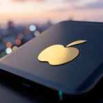 A close-up shot of a golden apple logo on a sleek, modern, futuristic looking device, symbolizing leadership change and innovation in a digital era. The background shows blurred city lights at dawn, suggesting a new beginning.