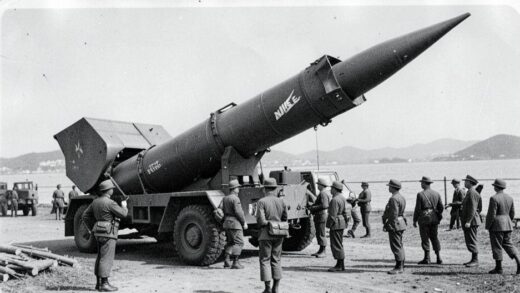 Historical black and white photo of 1960s Nike Hercules missile being deployed in South Korea with soldiers in uniform, vintage military atmosphere